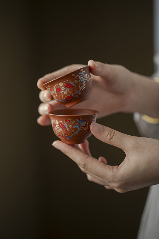 Vintage vermilion clay and purple clay tea cups for home consumption, tea cups, Kung Fu tea sets, single cups, annual fish cups