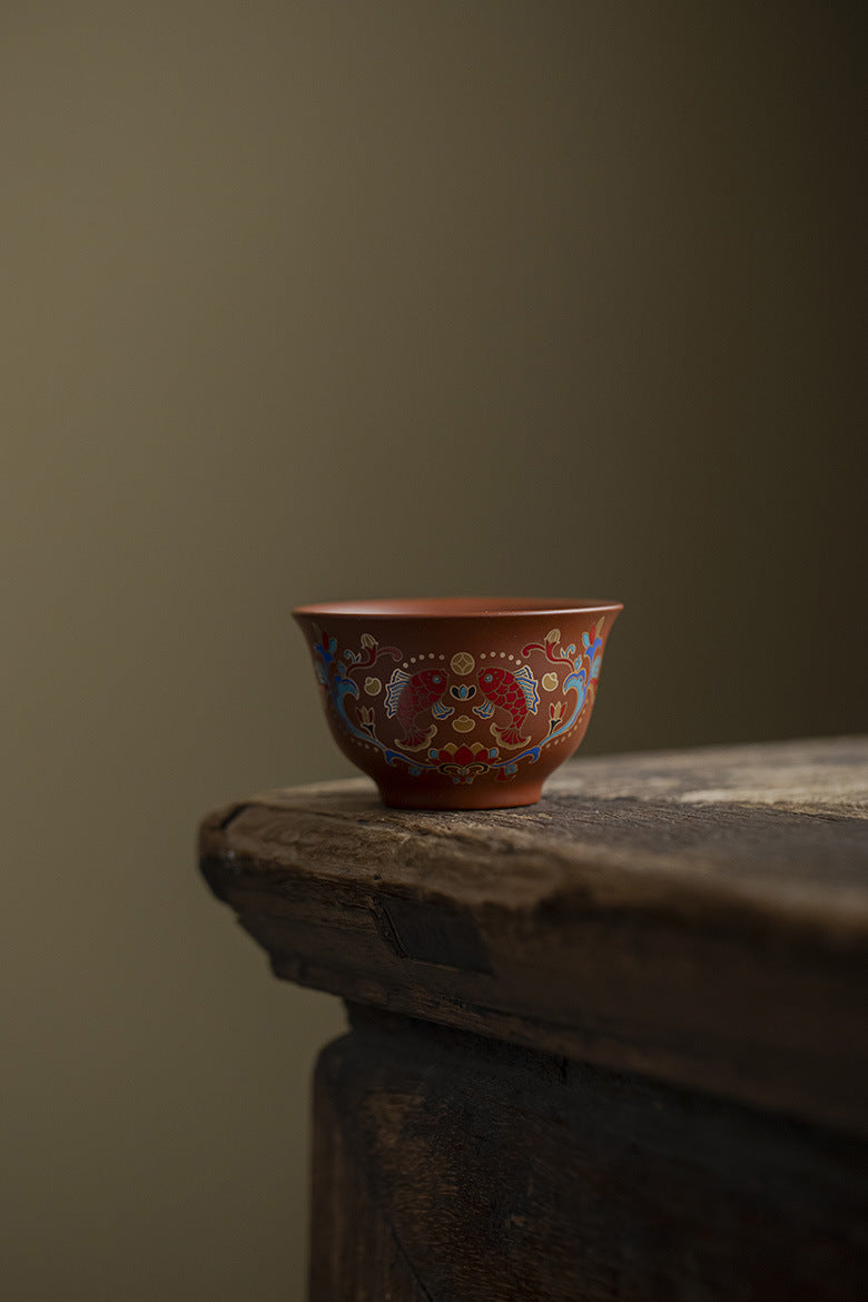 Vintage vermilion clay and purple clay tea cups for home consumption, tea cups, Kung Fu tea sets, single cups, annual fish cups